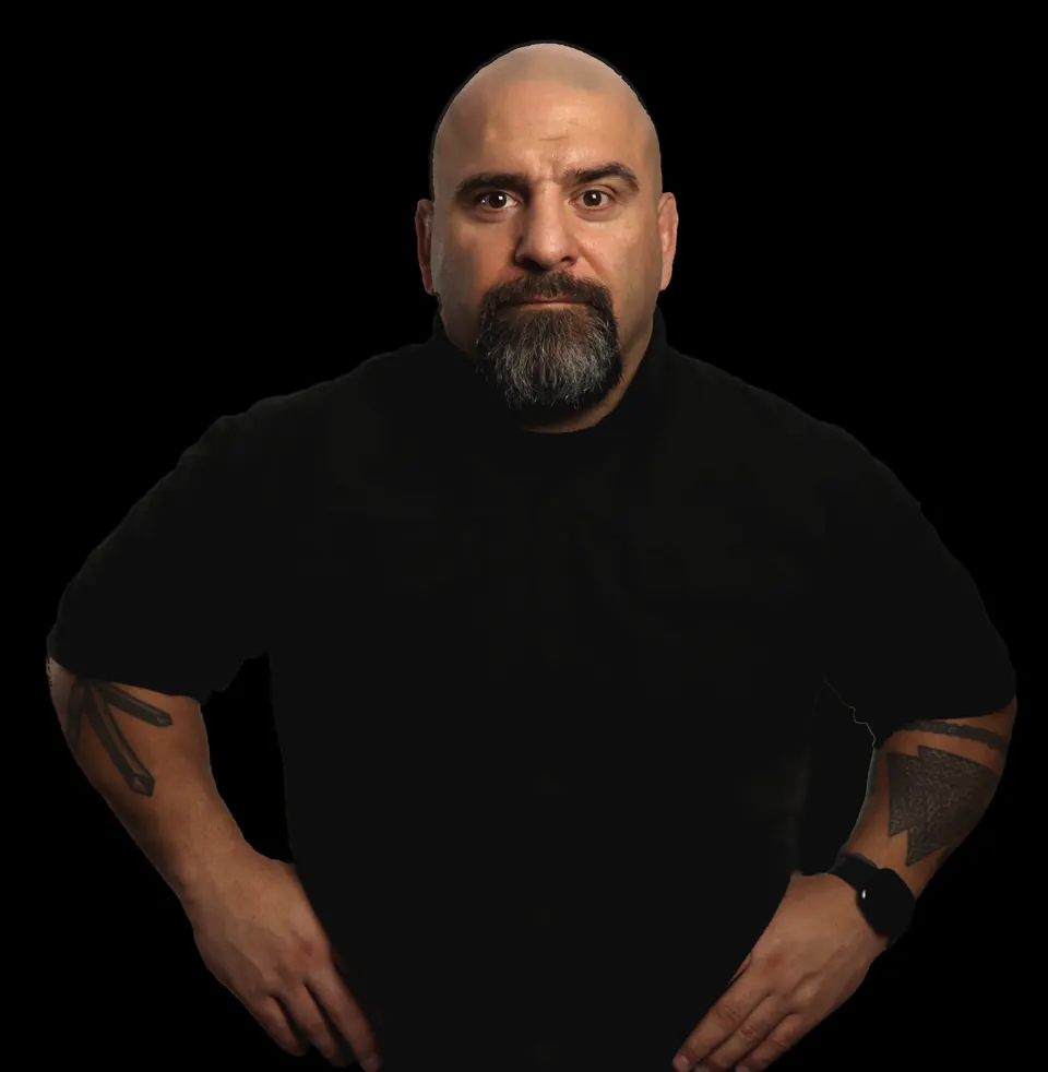 Master Chim with his hands on his hips