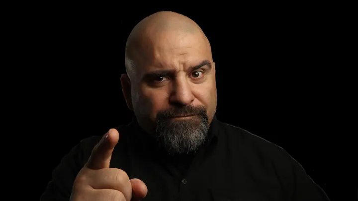 Master Chim pointing at the camera